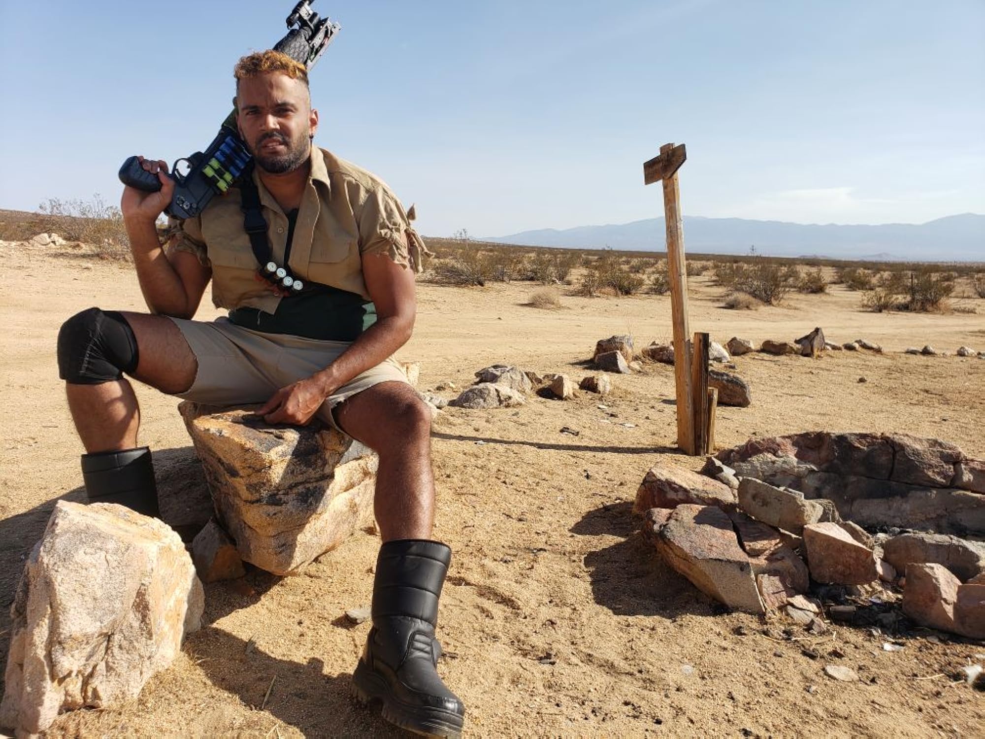 Rayniel Rufino as Pucho in the desert, Scumbags