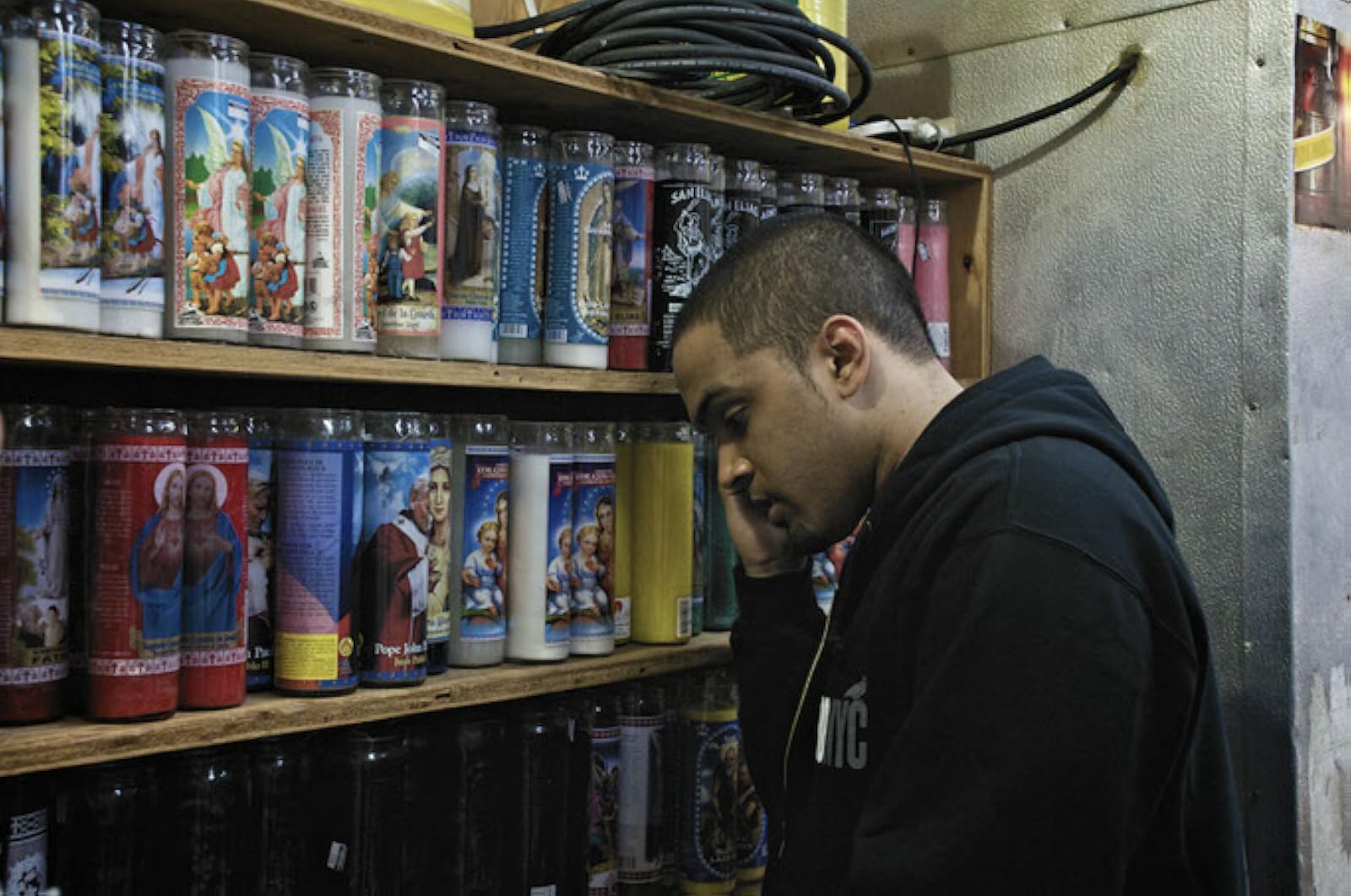 Rayniel Rufino as Diego Santiago in a bodega, Trouble in the Heights